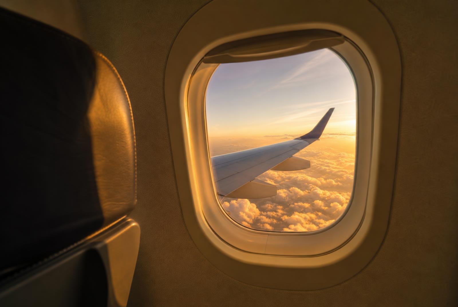 View from an aircraft window at sunset
