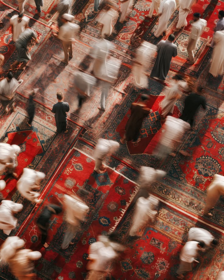 Pilgrims crossing prayer carpets
