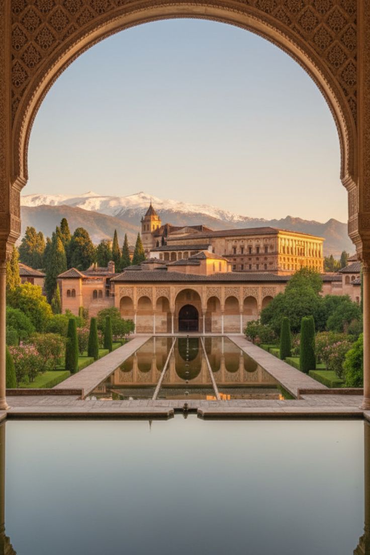 The Alhambra in Granada seen through a horseshoe arch